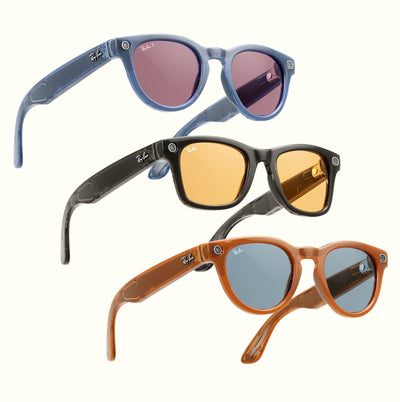 Three pairs of Ray-Ban Meta smart glasses in translucent blue, black with amber lenses, and brown frames